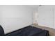 The spacious bedroom features carpet and a double door closet at 16051 Weathered Windmill Ter, Odessa, FL 33556