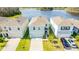 Aerial view of a home with a two car garage at 16051 Weathered Windmill Ter, Odessa, FL 33556