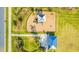 Aerial view of community playground and adjacent picnic pavillion at 16051 Weathered Windmill Ter, Odessa, FL 33556