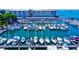 Vibrant marina view featuring numerous boats docked in a calm waterfront setting at 1754 Patricia Ave, Dunedin, FL 34698