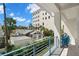 Spacious balcony with seating area and railing, offering city views at 19 Somerset St, Clearwater Beach, FL 33767