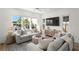 Stylish and comfortable living area with modern décor, ample seating, and a relaxed ambiance at 19 Somerset St, Clearwater Beach, FL 33767