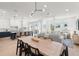 Spacious open floor plan featuring a modern kitchen, dining area, and comfortable living room at 19 Somerset St, Clearwater Beach, FL 33767