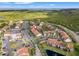 Aerial view showcasing the community's prime location, landscaping, and nearby amenities at 1986 Pelican Landing Blvd # 1514, Clearwater, FL 33762