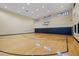 Spacious indoor basketball court with hardwood flooring, ample lighting, and high ceilings at 1986 Pelican Landing Blvd # 1514, Clearwater, FL 33762