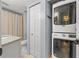Well-lit Laundry area with a washer and dryer at 1986 Pelican Landing Blvd # 1514, Clearwater, FL 33762