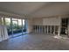 Living room view featuring an outside patio area, light-colored walls, and flooring at 200 Country Club Dr # 1303, Largo, FL 33771