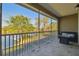 Enjoy serene water views from this screened balcony, perfect for relaxing and entertaining at 21205 Calle Rosa Dr # 10, Land O Lakes, FL 34637