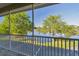 Relax on this screened balcony overlooking a serene pond with fountain views at 21205 Calle Rosa Dr # 10, Land O Lakes, FL 34637