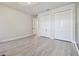 Bright bedroom features two closets with ample room and neutral colors at 21205 Calle Rosa Dr # 10, Land O Lakes, FL 34637
