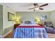 Bedroom featuring bed and ceiling fan at 2595 Countryside Blvd # 8-305, Clearwater, FL 33761