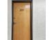 Front door of unit 305 with visible unit number on a textured wall at 2595 Countryside Blvd # 8-305, Clearwater, FL 33761