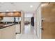 Open kitchen view showing modern appliances and granite countertops at 2595 Countryside Blvd # 8-305, Clearwater, FL 33761