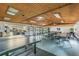 Spacious meeting room with tables, chairs, and a kitchenette at 2595 Countryside Blvd # 8-305, Clearwater, FL 33761