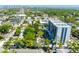 Building aerial view in an urban neighborhood with mature trees at 3211 W Swann Ave # 602, Tampa, FL 33609