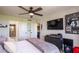 A large bedroom with double doors leading to other rooms and an open layout at 3211 W Swann Ave # 602, Tampa, FL 33609