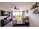Bright bedroom with balcony access, providing ample natural light and outdoor views at 3211 W Swann Ave # 602, Tampa, FL 33609