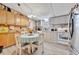 Charming kitchen area with light wood cabinets, and a cozy table at 328 S Port Royal Ln, Apollo Beach, FL 33572
