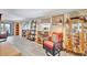 Charming living room featuring wood floors, decor, and lots of natural light at 328 S Port Royal Ln, Apollo Beach, FL 33572