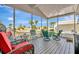 Relaxing screened porch offers ample seating with views of the surrounding community at 328 S Port Royal Ln, Apollo Beach, FL 33572