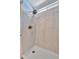 Step into this tiled shower featuring an adjustable shower head and sleek, modern design at 328 S Port Royal Ln, Apollo Beach, FL 33572