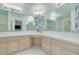 Bright bathroom with dual sinks, vanity area, and a fresh, clean design at 3330 San Bernadino St, Clearwater, FL 33759