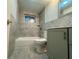 Bathroom featuring updated fixtures, tiled walls, and a clean, modern design at 4033 Newcastle Dr, New Port Richey, FL 34652