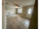 The interior features tiled flooring and neutral paint, complemented by a ceiling fan and window at 4033 Newcastle Dr, New Port Richey, FL 34652