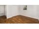 Bedroom with hardwood floors and a closet at 4421 W Iowa Ave, Tampa, FL 33616