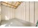 Interior of a storage shed with exposed rafters at 4421 W Iowa Ave, Tampa, FL 33616