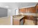 Modern kitchen with granite countertops, stainless steel appliances, and an open layout at 4515 Fieldview Cir, Wesley Chapel, FL 33545