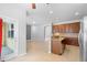 Well-designed kitchen with an island, granite countertops, and stainless steel appliances at 4515 Fieldview Cir, Wesley Chapel, FL 33545