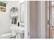 Clean bathroom with storage shelving and a window at 54 Aegean Ave, Tampa, FL 33606