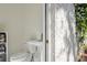 Bathroom featuring a white vanity, toilet, and decorative towels at 54 Aegean Ave, Tampa, FL 33606