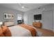 Well-designed bedroom with warm tones, sleek furniture, and ample natural light offers a relaxing retreat at 54 Aegean Ave, Tampa, FL 33606