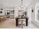 Open dining area with view to the living room and abundant natural light at 54 Aegean Ave, Tampa, FL 33606