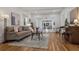 Bright living room featuring hardwood floors, neutral furniture, and plenty of space, ideal for relaxing and entertaining at 54 Aegean Ave, Tampa, FL 33606