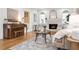 Spacious living room features hardwood floors, fireplace, piano, and ample seating, perfect for entertaining guests at 54 Aegean Ave, Tampa, FL 33606