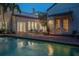 Beautiful backyard pool with brick-paved patio, perfect for entertaining or relaxation at 54 Aegean Ave, Tampa, FL 33606