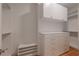 Bright walk-in closet with shelving, drawers, cabinets, and ample storage space, ready for your wardrobe at 54 Aegean Ave, Tampa, FL 33606