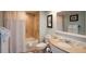 Well-lit bathroom with a shower and tub combination and a granite vanity at 5500 Gulf Blvd # 2229, St Pete Beach, FL 33706