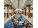 Elegant lobby featuring palm trees, seating, and a view of the front desk at 5500 Gulf Blvd # 2229, St Pete Beach, FL 33706