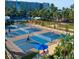 Multiple pickleball courts provide an active recreational outlet within a beautifully landscaped community at 5500 Gulf Blvd # 2229, St Pete Beach, FL 33706
