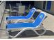 Poolside lounge chairs on the patio, perfect for relaxation and enjoying the outdoor space at 5500 Gulf Blvd # 2229, St Pete Beach, FL 33706