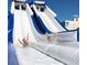 An exhilarating waterslide stands ready for summer fun, offering a thrilling experience for all ages at 5500 Gulf Blvd # 2229, St Pete Beach, FL 33706