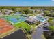 A high angle view of the community pool, tennis courts, and other amenities at 6239 French Creek Ct, Ellenton, FL 34222