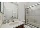 Cozy bathroom with a shower and bathtub combo, large mirror, and single sink at 6239 French Creek Ct, Ellenton, FL 34222