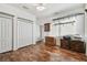 Bedroom with hardwood floors, ceiling fan, closet, and natural light at 6239 French Creek Ct, Ellenton, FL 34222