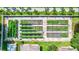 Aerial view of meticulously organized gardens with diverse vegetation, showcasing a thriving agricultural space at 6501 62Nd N St, Pinellas Park, FL 33781