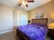 Comfortable bedroom with natural light, a cozy bed, and ample closet space at 7123 Colonial Lake Dr, Riverview, FL 33578